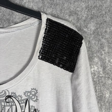 Load image into Gallery viewer, Grey Graphic Wings Cross Tee with Sequin Shoulders – Size 2XL
